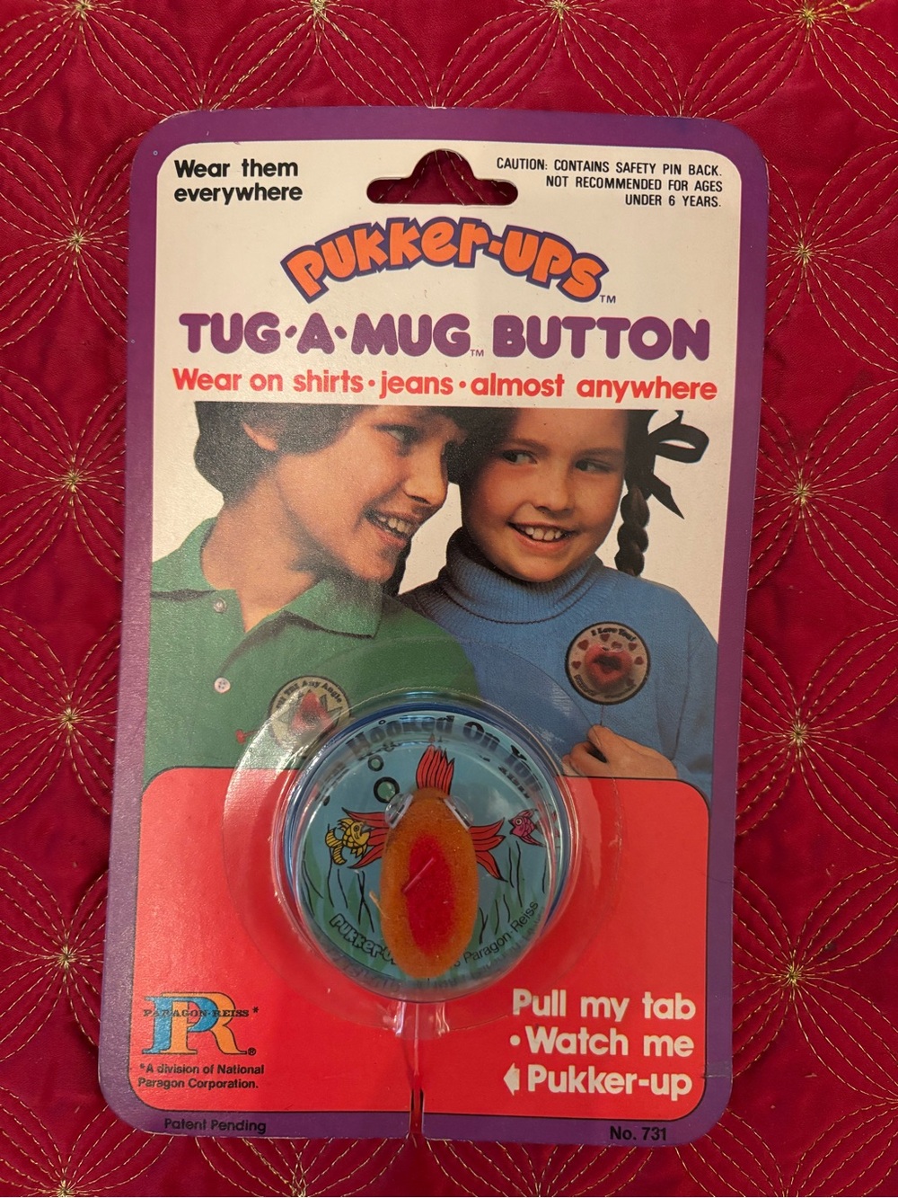 Pukker-Ups Tug-A-Mug Button - Red & Orange Fish